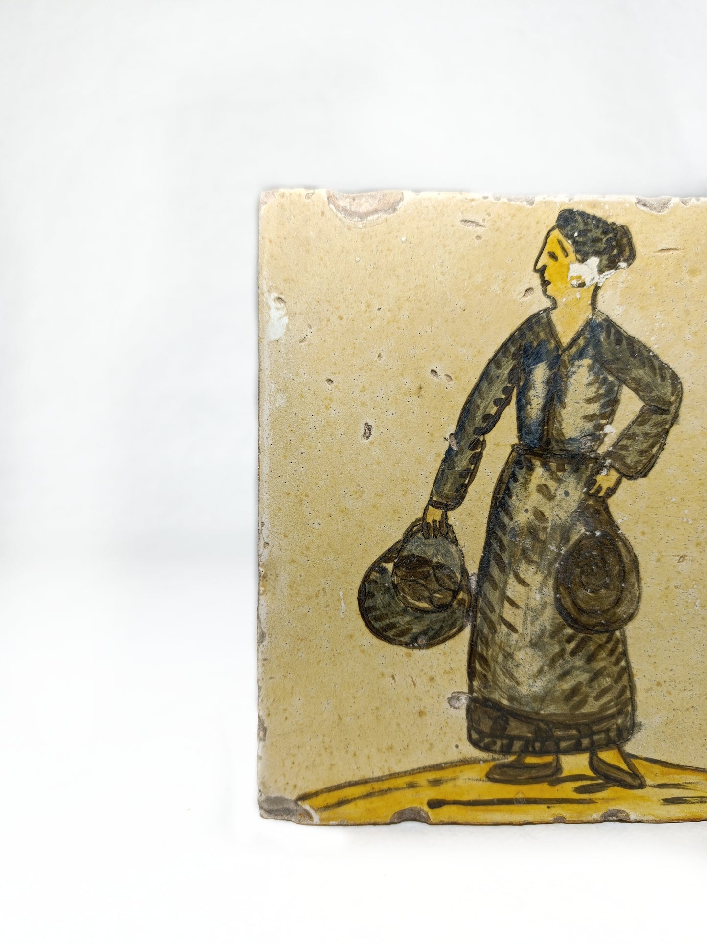Baldosa de Rajolería Catalana del Siglo XIX con Imagen de Mujer y Cesto